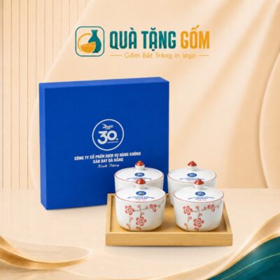 Bộ 4 hũ mứt quà tặng in logo dáng tròn vẽ hoa đào hồng QTG-KM01