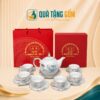 Bộ ấm chén trà quà tặng in logo dáng bưởi lửa vẽ hoa sen viền vàng kim QTG-AC08